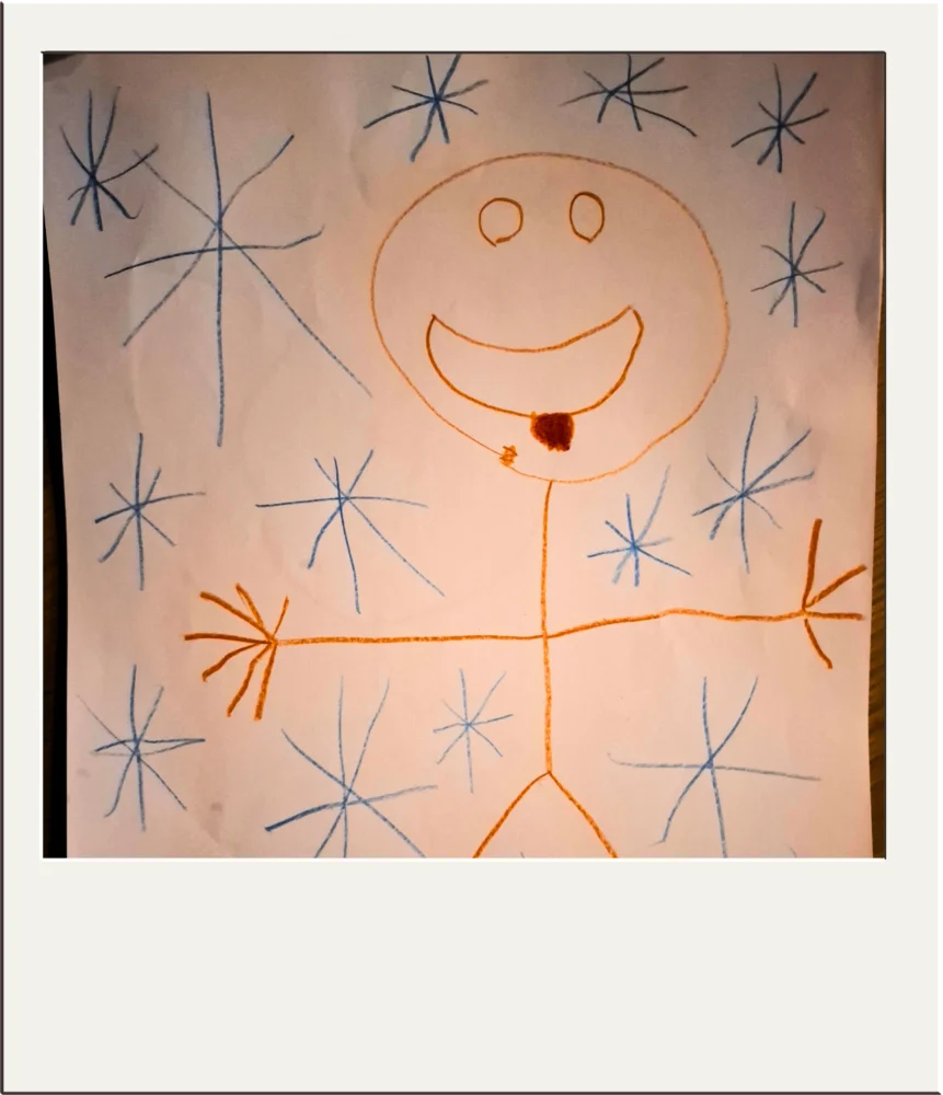 Polaroid nuotrauka su vaiko piešiniu